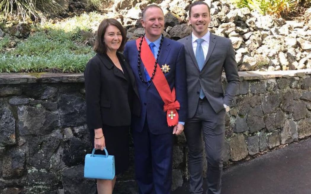 Sir John Key, after his investiture at Government House, with wife Bronagh and son Max