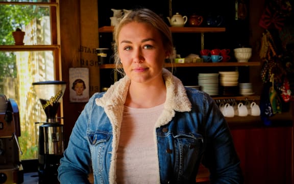 Rebecca Algie of Bridge Cafe says business had dropped 70 percent, but she'll keep the cafe open.