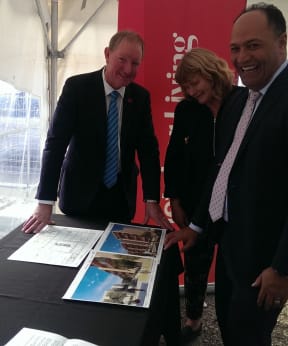 The Minister for Building and Housing Nick Smith, Christchurch deputy Mayor Vicki Buck and Fletcher Living general manager Ken Lotu-Iiga check out the plans for the new housing development in central Christchurch.