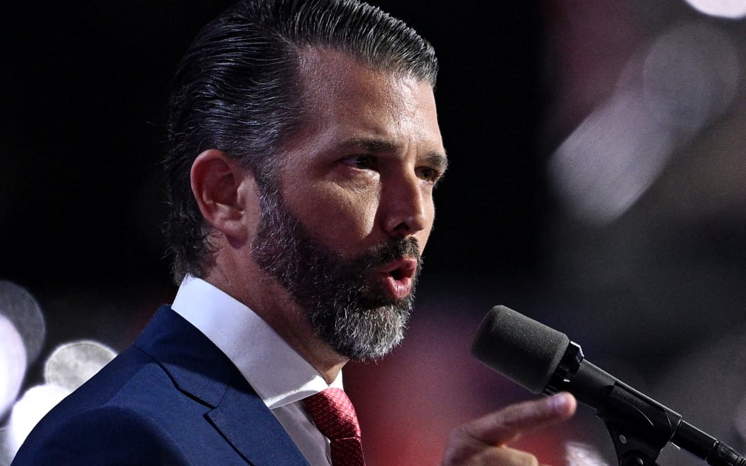 Son of former US President Donald Trump Donald Trump Jr. speaks during the third day of the 2024 Republican National Convention at the Fiserv Forum in Milwaukee, Wisconsin, on July 17, 2024. Days after he survived an assassination attempt Donald Trump won formal nomination as the Republican presidential candidate and picked Ohio US Senator J.D. Vance for running mate. (Photo by Brendan SMIALOWSKI / AFP)