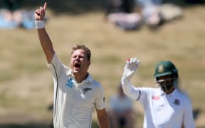 Neil Wagner celebrates picking up the wicket of Bangladesh's Mominul Haque.