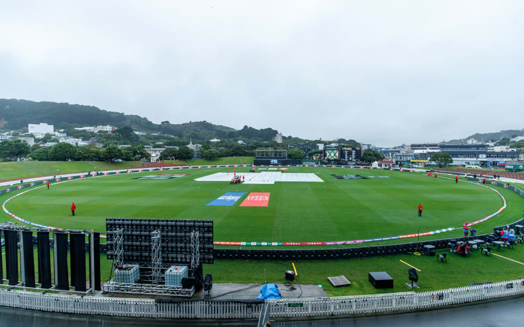 Covers back on at a wet Basin Reserve.