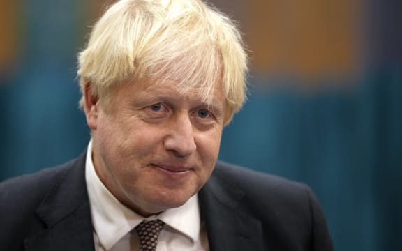 Britain's Prime Minister Boris Johnson speaks to the media as he visits a Covid-19 vaccination centre at Little Venice Sports Centre in London on October 22, 2021.