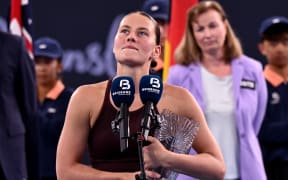 Marta Kostyuk of Ukraine speaks after defeat in the women's singles final against Aryna Sabalenka of Belarus at the Brisbane International tennis tournament in Brisbane.
