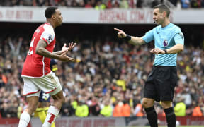 David Coote officiating in an English premier league between Arsenal and Bournemouth in 2024.