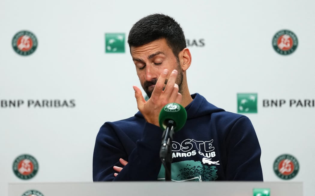 Serbia's Novak Djokovic holds a press conference after he lost his men's singles semi-final match against Italy's Jannik Sinner on day 13 of the French Open tennis tournament on Court Philippe-Chatrier at the Roland-Garros Complex in Paris on June 6, 2025. (Photo by Dimitar DILKOFF / AFP)