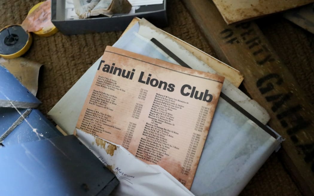 Colin Payne said he's devastated to see 85 years worth of collections and family heirlooms drenched by floodwaters.