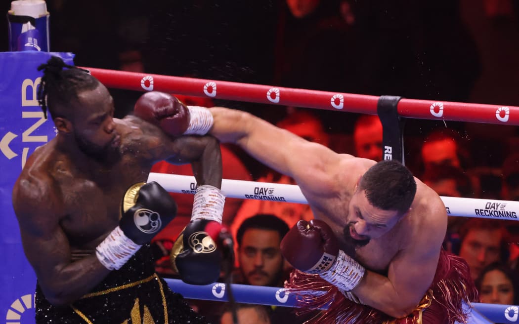 Deontay Wilder and New Zealand's Joseph Parker face off in their heavyweight boxing match in Riyadh.