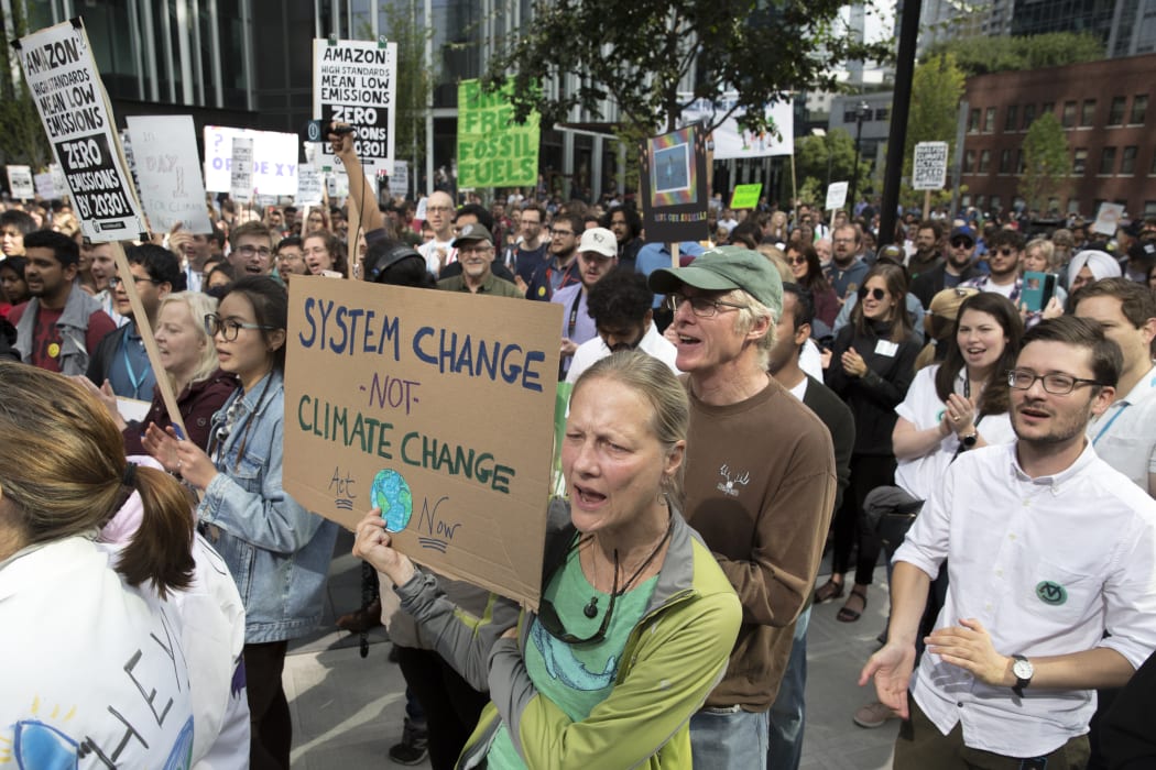 Amazon Employees for Climate Justice lead a walk out and rally at the company's headquarters to demand that leaders take action on climate change in Seattle, Washington on September 20, 2019.