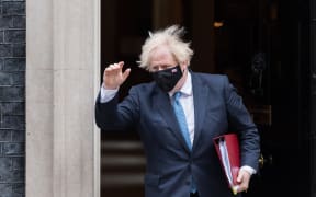 British Prime Minister Boris Johnson leaves 10 Downing Street for PMQs at the House of Commons.