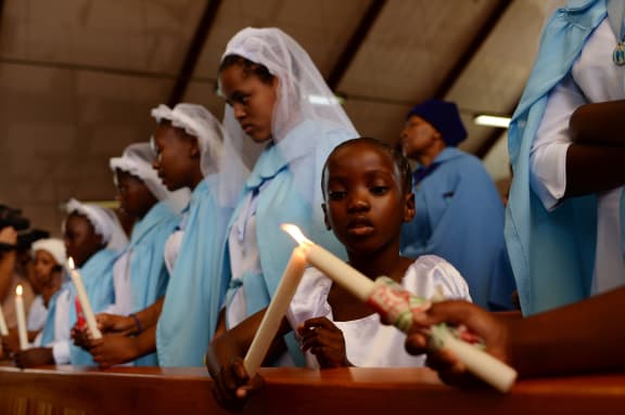 Churchgoers at a mass in Soweto, near Johannesburg.