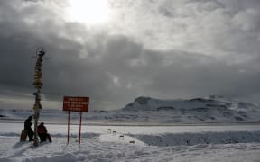 Two Chilean marines take a rest at Chile's military base Presidente Eduardo Frei, in the King George island, in Antarctica, on March 13, 2014.