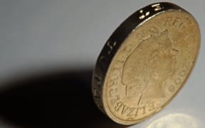 A British one pound coin.