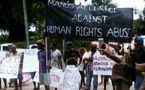 Local Manusians demonstrate in support of the refugees.