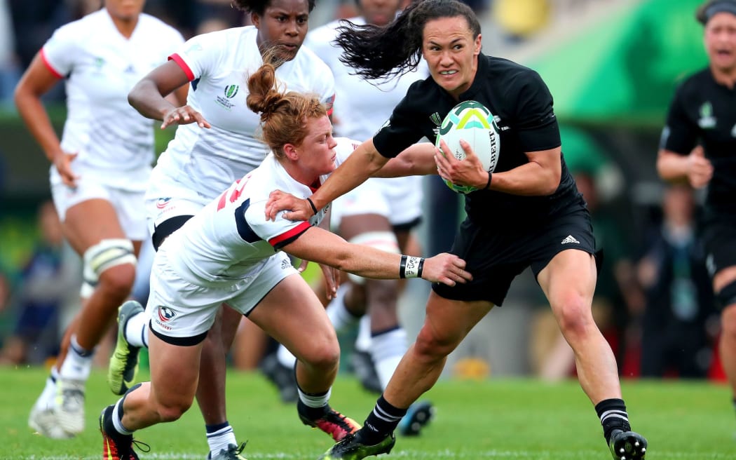 Portia Woodman fends off Akev Kelter of the USA, during the Black Ferns' semi-final game at the Rugby World Cup.