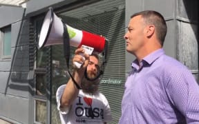 Otago University's proctor says sorry to portesters on Fridauy via a Students Association bullhorn.
