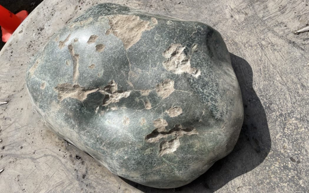 The damaged pounamu touchstone on the cultural compass on Mt Maunganui.