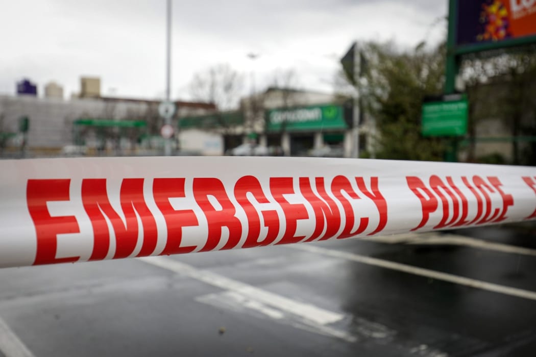 Cordons outside Countdown on Cumberland Street, Dunedin after a stabbing.