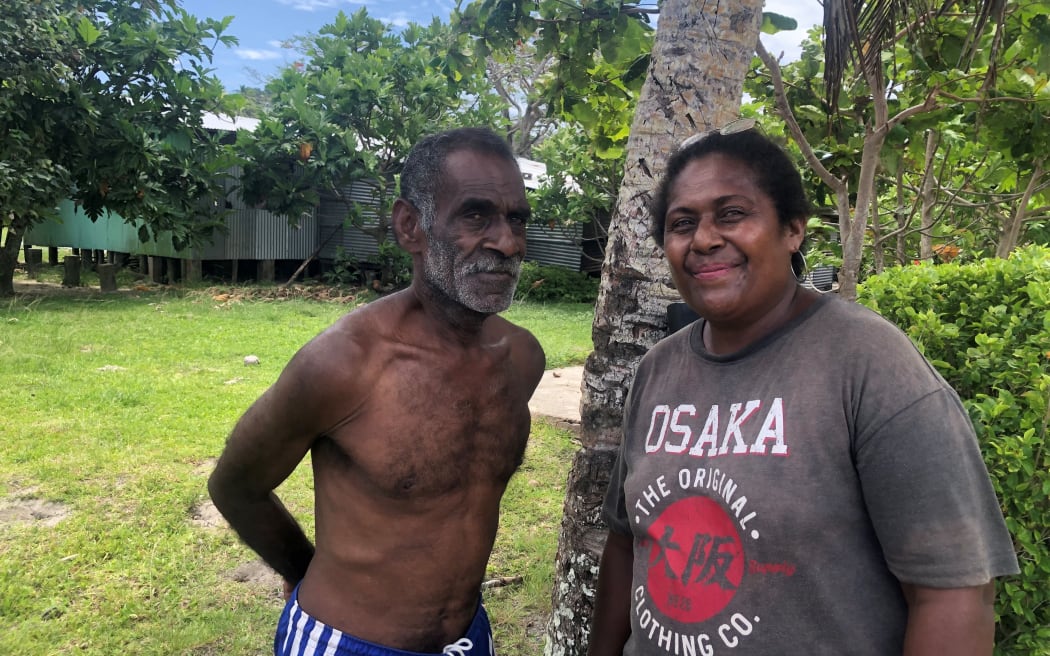 Bill Ramasi and his wife Vitauna at their village on Vanua Levu that is sinking beneath the sea