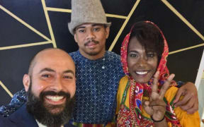 Nikolai Miklouho-Maclay with Papua New Guinea models in Russian garb at PNG Fashion Week 2019.