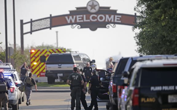 ALLEN, TEXAS - MAY 6: Emergency personnel work the scene of a shooting at Allen Premium Outlets on May 6, 2023 in Allen, Texas. According to reports, a shooter opened fire at the outlet mall, injuring nine people who were taken to local hospitals. The police have confirmed there were fatalities but have not specified how many. The unidentified shooter was neutralized by an Allen Police officer responding to an unrelated call.   Stewart F. House/Getty Images/AFP (Photo by Stewart F. House / GETTY IMAGES NORTH AMERICA / Getty Images via AFP)