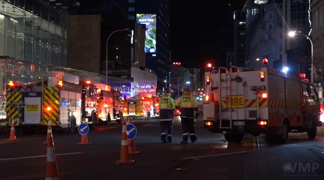 Firefighters at the Commercial Bay complex on Auckland's waterfront after fire broke out on the 22nd floor.
