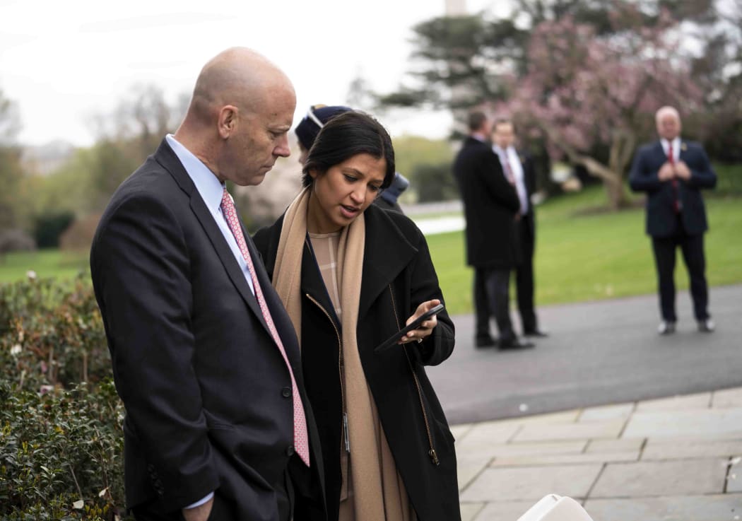In this file photo taken on March 24, 2020 Marc Short, Chief of Staff for Vice President Mike Pence (L) talks with Katie Miller, Vice President Mike Pence's press secretary