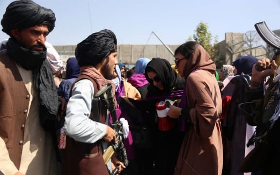 Taliban clash with women's rights protesters in Kabul.
