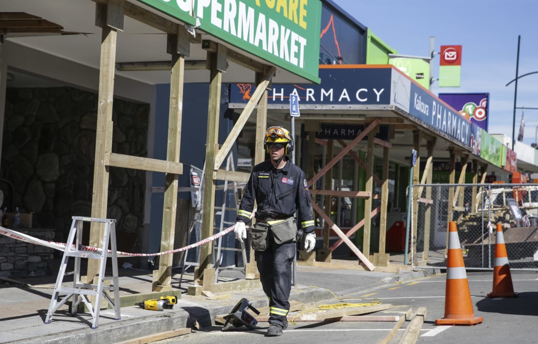 Shops on the main street in Kaikoura have structural work done on them.