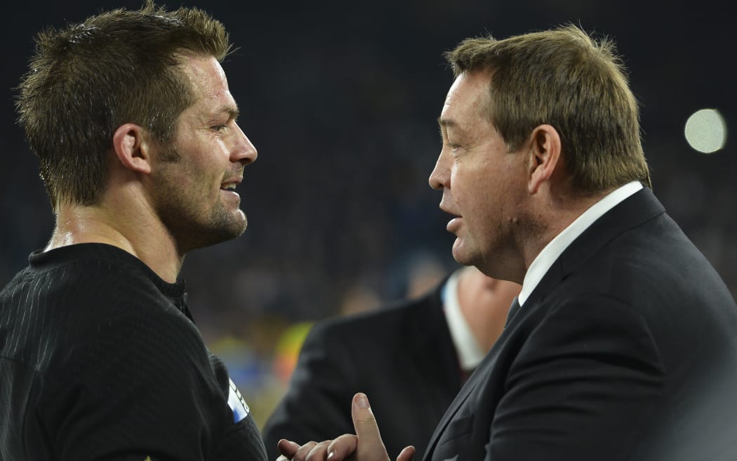 Richie McCaw talks to Steve Hansen after the All Blacks won the 2015 Rugby World Cup.