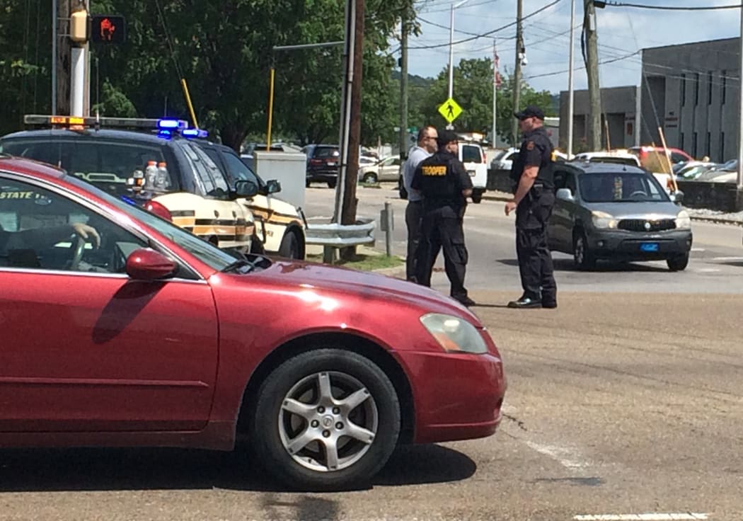 Police hold their positions at a road block in Chattanooga, Tennessee.