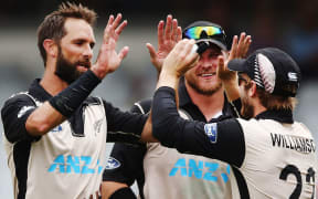 Grant Elliott celebrates with Kane Williamson and Corey Anderson, January, 2016.