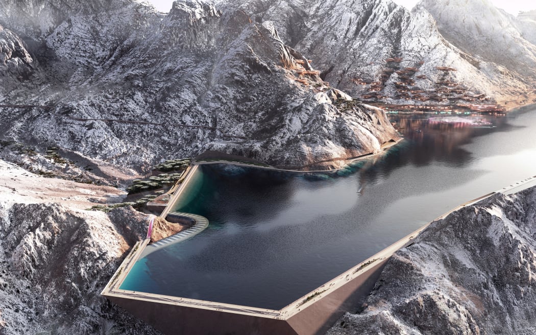 A handout image provided by NEOM on Octobre 5, shows a view of the design plan for Trojena, an area in Saudi Arabia's planned megacity of NEOM chosen to host the 2029 Asian Winter Games. Saudi Arabia was chosen to host the 2029 Asian Winter Games at NEOM, an under-construction $500 billion futuristic desert megacity that planners say will feature a year-round winter sports complex. The games are slated to take place in Trojena, an area of NEOM "where winter temperatures drop below zero Celsius (32 Fahrenheit) and year-round temperatures are generally 10 degrees cooler than the rest of the region", according to the project's website. (Photo by NEOM / AFP) / == RESTRICTED TO EDITORIAL USE - MANDATORY CREDIT "AFP PHOTO / HO / NEOM - NO MARKETING NO ADVERTISING CAMPAIGNS - DISTRIBUTED AS A SERVICE TO CLIENTS ==