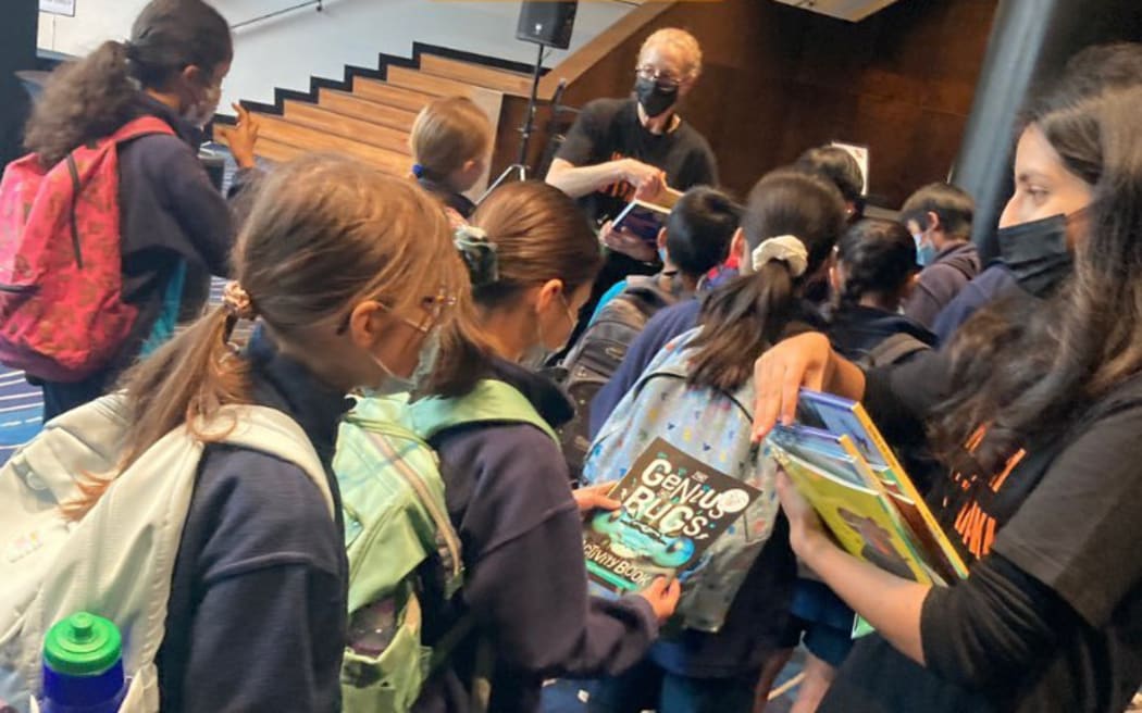 Students sample books at the Auckland Writers Festival.
