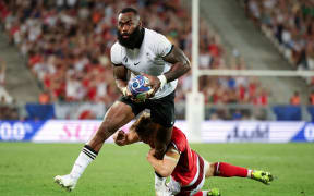 BORDEAUX, FRANCE - SEPTEMBER 10: Semi Radradra of Fiji is tackled by Sam Costelow of Wales during the Rugby World Cup France 2023 match between Wales and Fiji at Nouveau Stade de Bordeaux on September 10, 2023 in Bordeaux, France. (Photo by Adam Pretty - World Rugby/World Rugby via Getty Images)