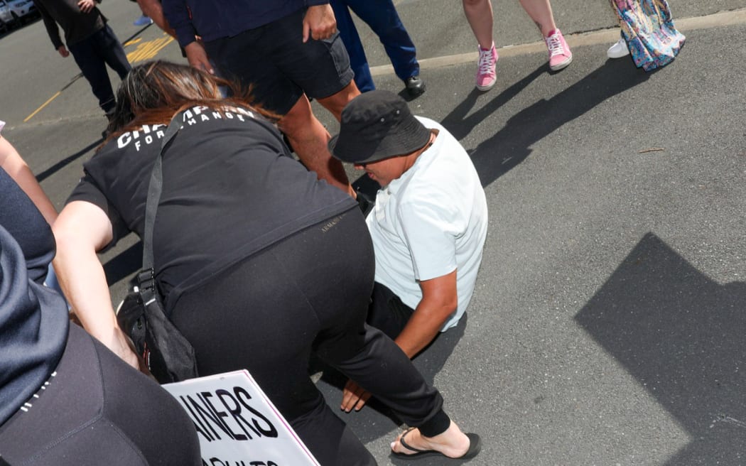 A man was pushed to the ground during a scuffle.