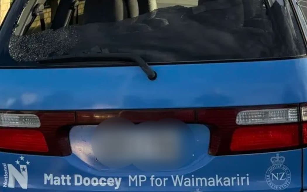 The damage to MP Matt Doocey's car, that he says appears to have been done by someone throwing a rock through the window.