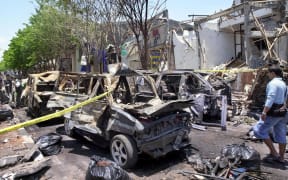 Kuta, near Denpasar, on the island of Bali, 14 October 2002, following the car bombing late 12 October that killed at least 190 people.