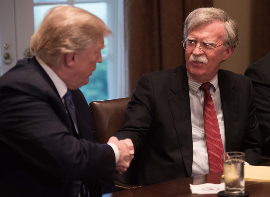 US President Donald Trump with National Security Advisor John Bolton during a meeting with senior military leaders at the White House in Washington, DC.in April 2018.