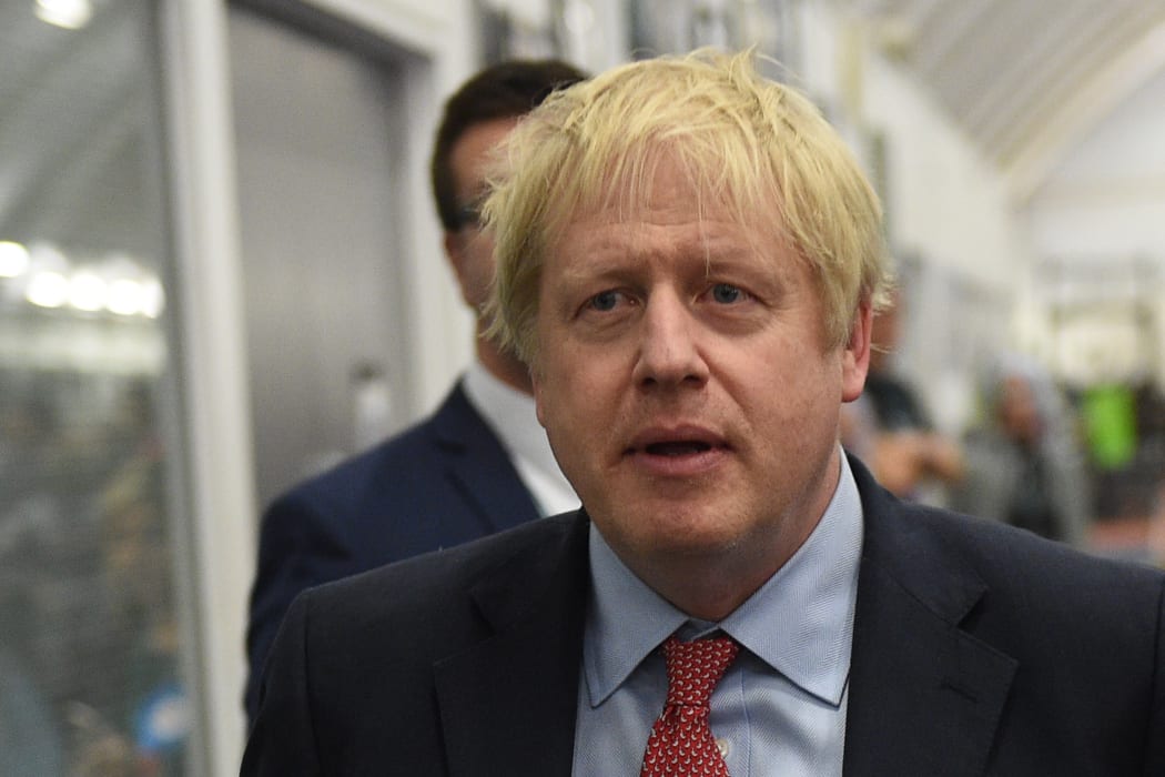Britain's Prime Minister and Conservative leader Boris Johnson arrives at the count centre in Uxbridge, west London, as votes were counted as part of the UK general election.