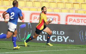 Samoa captain Faalemiga Selesele can't stop Ignacio Martin from crossing for the winning try.