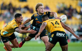 Chiefs Damian McKenzie playing against the Hurricanes 2021.