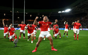 In this handout image provided by World Rugby, Sonatane Takulua of Tonga leads the performance of the Sipi Tau prior to the Rugby World Cup France 2023 match between Ireland and Tonga at Stade de la Beaujoire on September 16, 2023 in Nantes, France. (Photo by World Rugby/World Rugby via Getty Images)