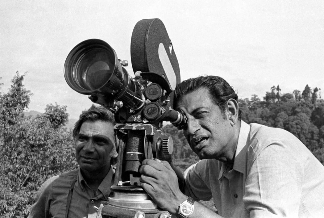 Director Satyajit Ray on location for Pather Panchali.