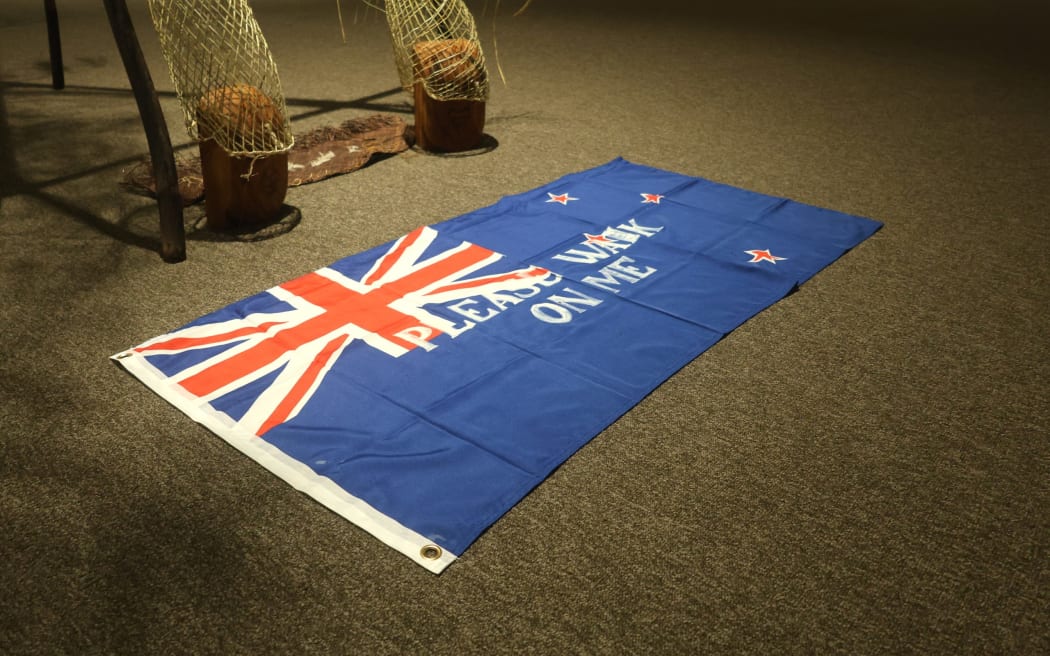 An artwork of a flag stencilled with the words “Please Walk On Me” has angered the local RSA who has labelled it an “insult” to veterans.