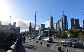People walk at parks and streets as the city partly gets crowded after people leave their homes as Victoria begins to ease coronavirus (COVID-19) restrictions