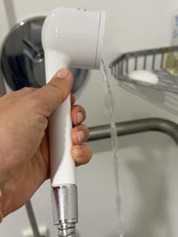 The low pressure of the water that a cancer patient was left with at Auckland City Hospital.