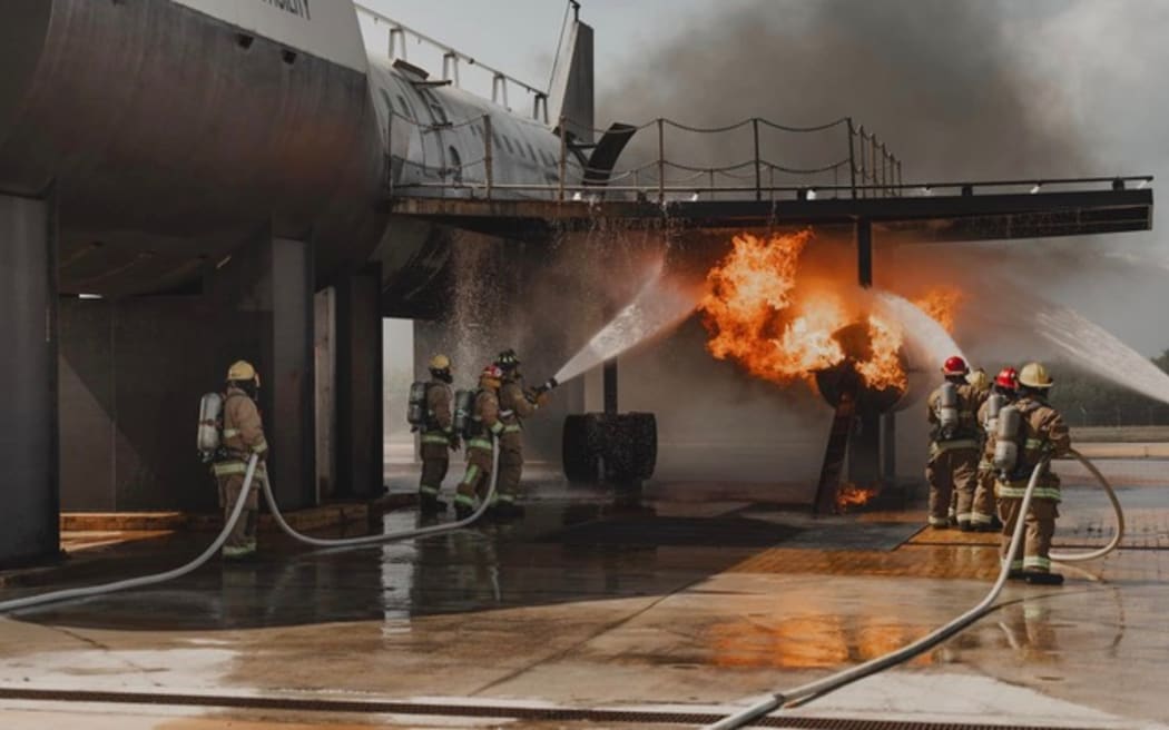 Fire crew battle a fire during a simulation exercise in the CNMI.