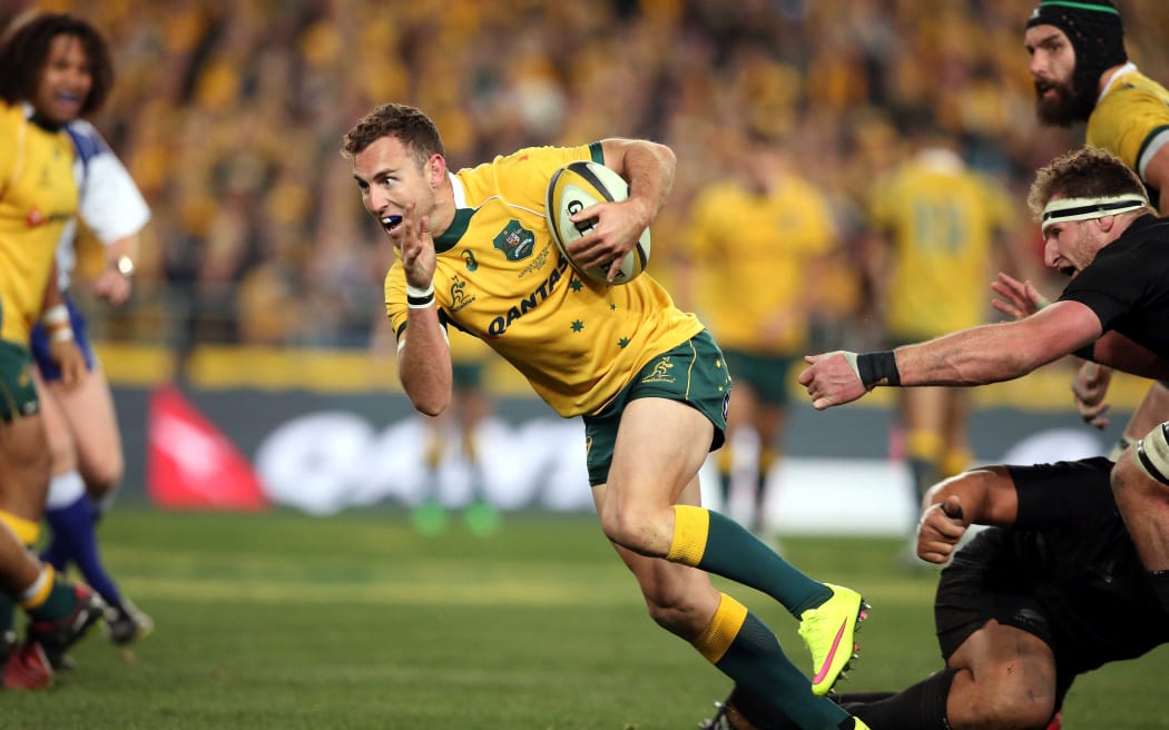 Nic White en route to the match-winning try against the All Blacks in Sydney