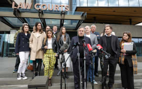 Plaintiffs, witnesses and supporters, including barrister Brian Henry and Gloriavale Leavers Support Trust manager Liz Gregory, hold a press conference outside the Christchurch courts following the decision about women being found workers - not volunteers-  being released.